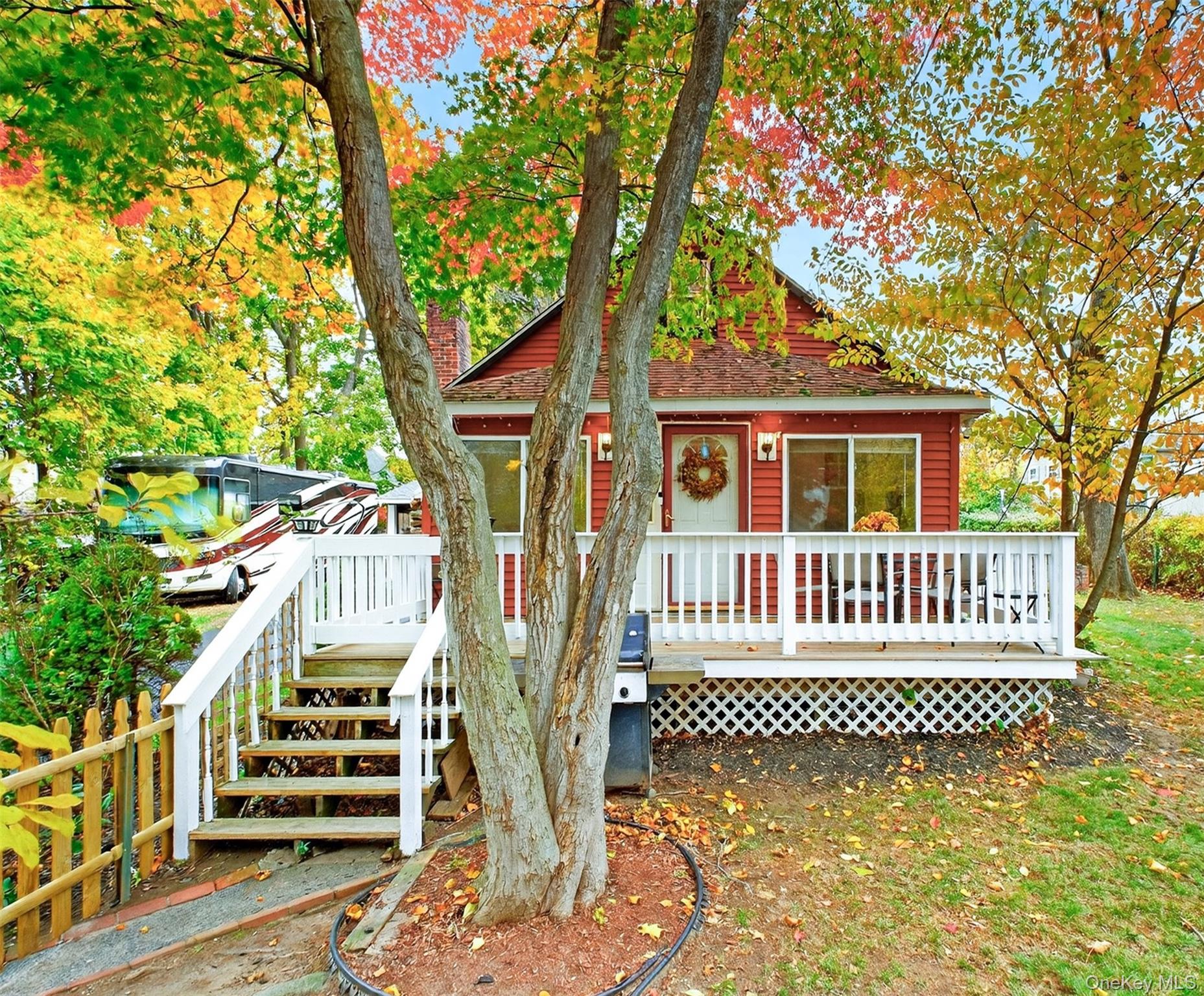 Charming home in walking distance to Lake Carmel & convenient to all major highways & Metro North.