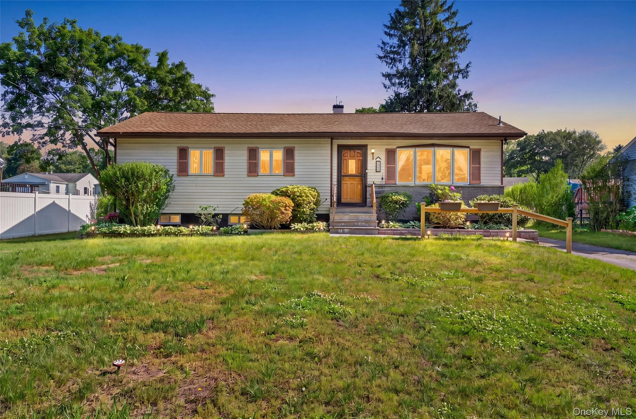 Move-in ready 3-bedroom ranch in Wappingers Falls offering sought-after one-level living, a fenced yard, and an expanded kitchen.