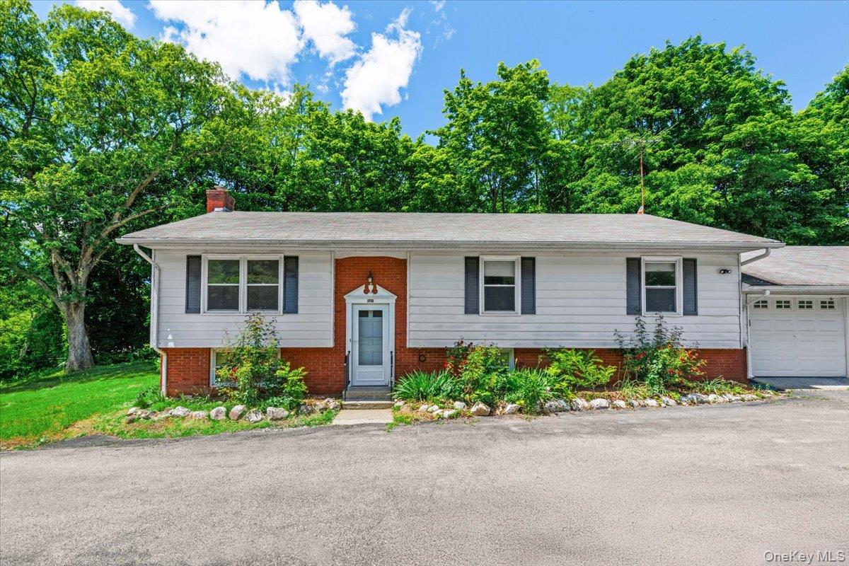 A welcoming single-family rental set within the peaceful Graymoor setting of Garrison.