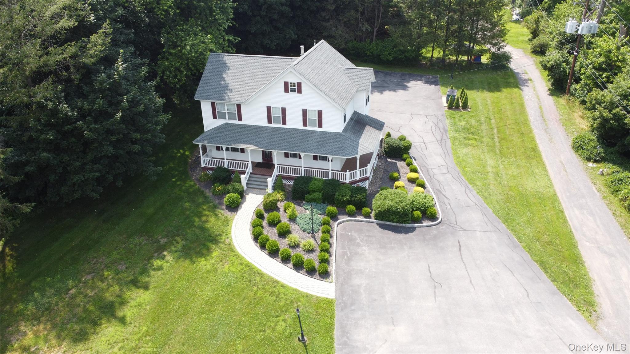 Aerial view of property and surrounding area