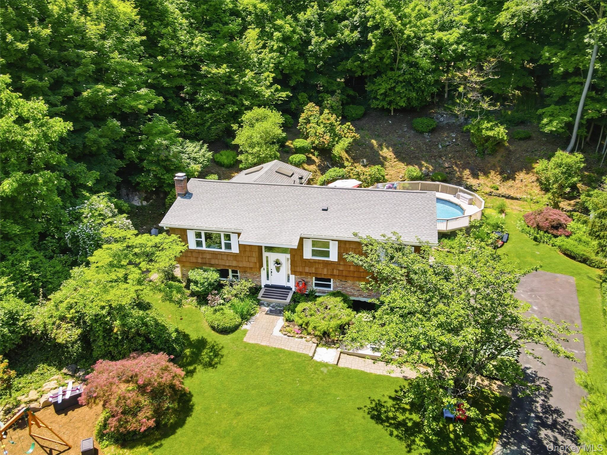 Welcome to 45 W Lakeview Road. The home sits on 1.1 acre on a desirable cul-de-sac in Cortlandt manor