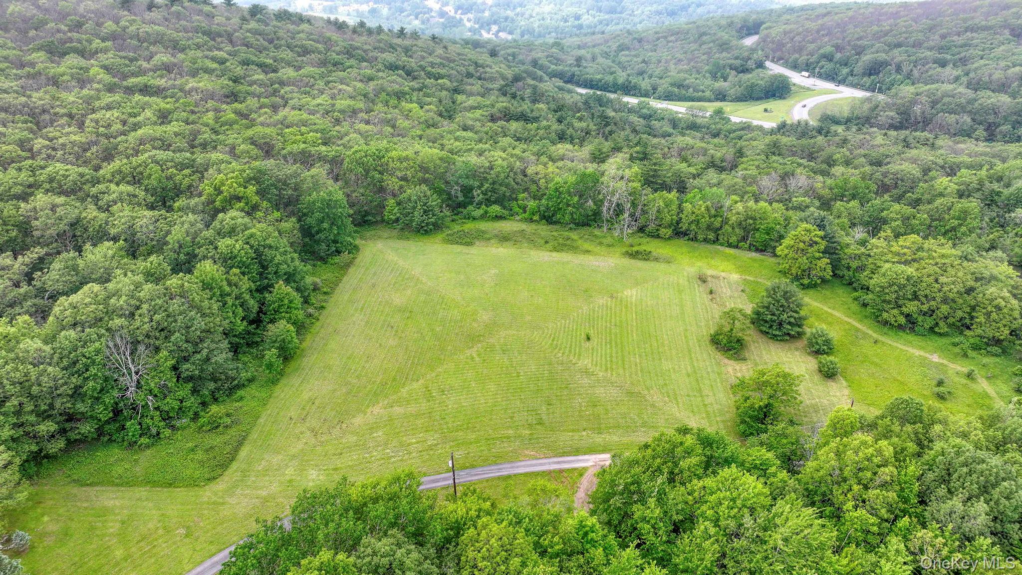 Drone / aerial view of a heavily wooded area