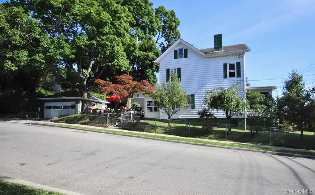 Maintained vintage Colonial, ideally situated on a desirable corner lot in the heart of the village!