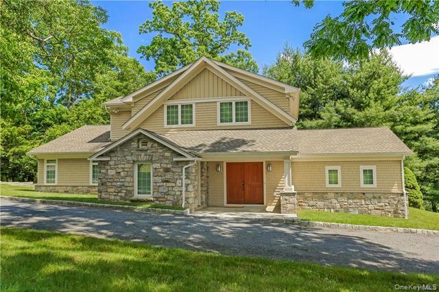 Stone  and Shingle Cape Style Home