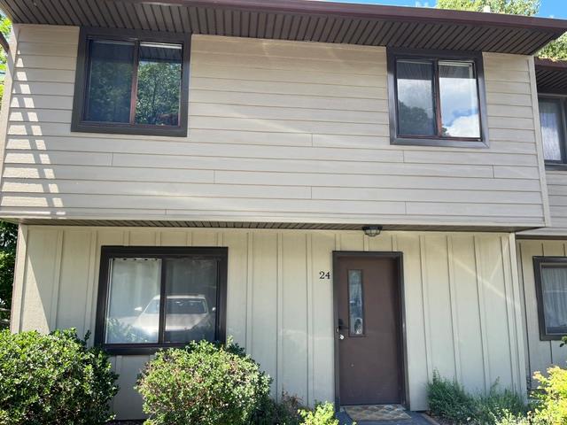 Front of unit showing new siding
