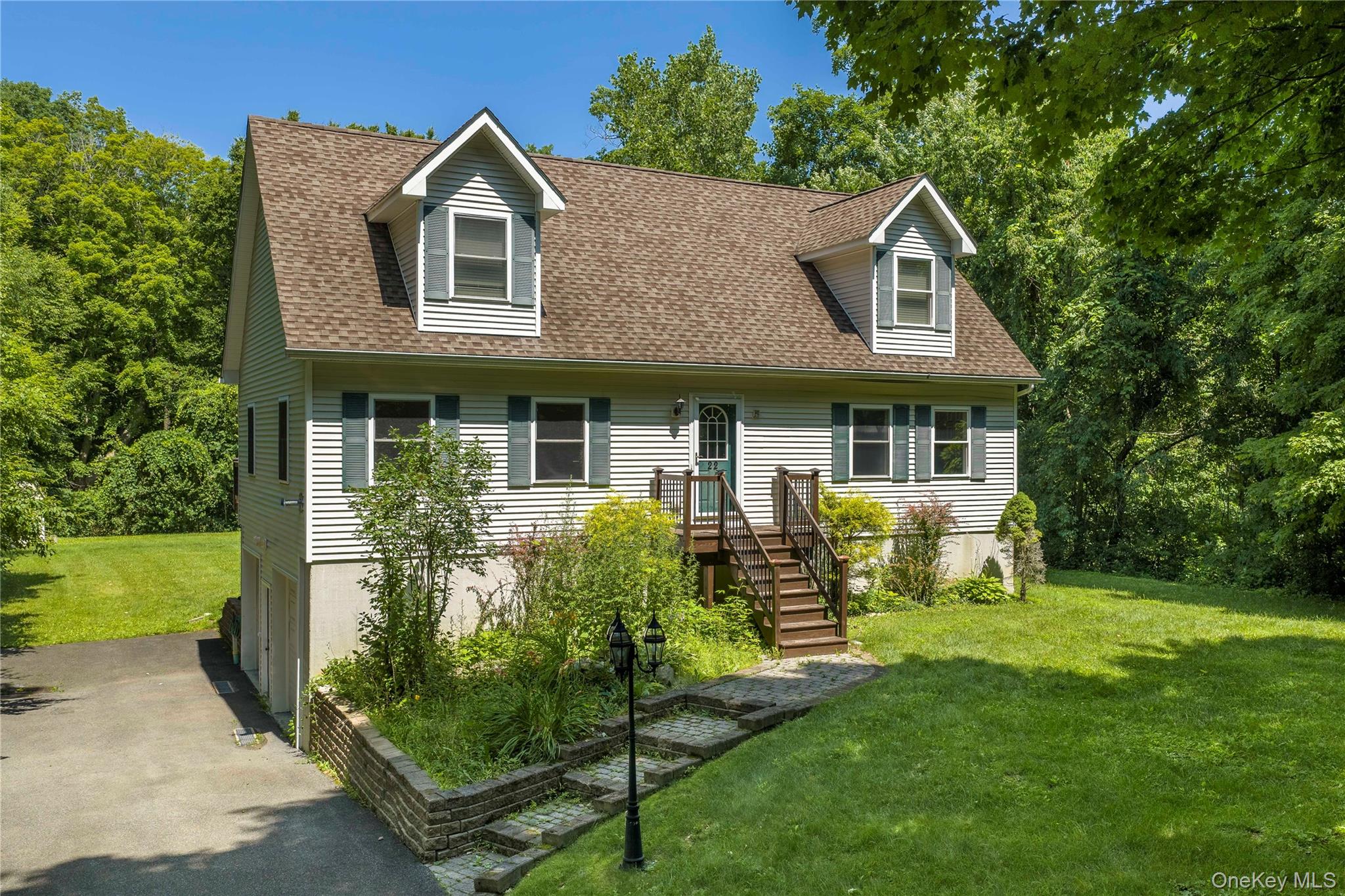Versatility, comfort, and an exceptional lifestyle come together in this charming Cape Cod-style home.