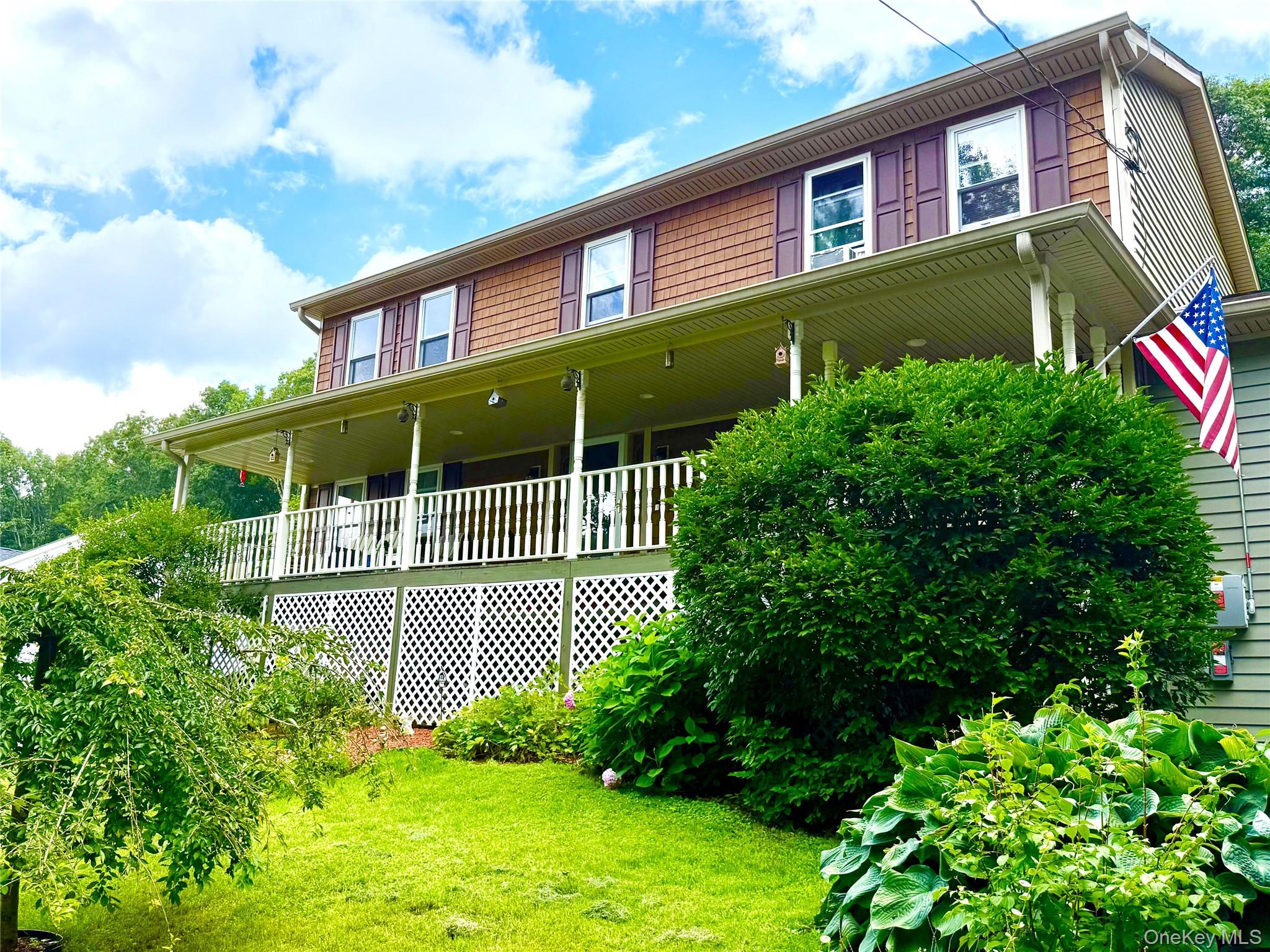 Great Colonial offers a covered rocking-chair porch, spacious LR, FR with fireplace, Primary BR & Full Bath.